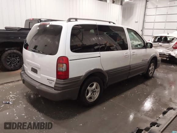 ✅ 2004 Pontiac Montana • VIN: 1GMDU03E74D167012 • Lot: 42211676. Listed on IAAI with 135,644 mi. Free auction sales archive from the USA and detailed vehicle history report at DreamBid. Image 4.