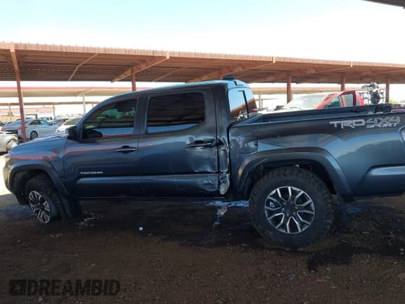 ✅ 2023 Toyota Tacoma SR • VIN: 3TMCZ5AN6PM577729 • Lot: 42164920. Listed on IAAI with 33,629 mi. Free auction sales archive from the USA and detailed vehicle history report at DreamBid. Image 15.