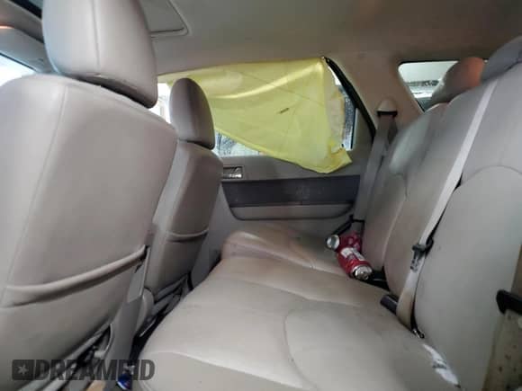 2009 Mercury Mariner Premier with VIN 4M2CU97709KJ02175, listed as a Copart auction lot 66205615 with 117,775 mi miles and Salvage title. Bid and sale history available at DreamBid. Image 11.