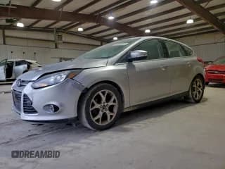 ✅ 2014 Ford Focus Titanium • VIN: 1FADP3N24EL422812 • Lot: 95954545. Listed on Copart with 156,298 mi. Free auction sales archive from the USA and detailed vehicle history report at DreamBid. Image 1.
