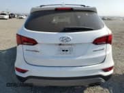 ✅ 2018 Hyundai Santa Fe 2.0T • VIN: 5XYZU4LA0JG554836 • Лот: 65013984. Опубликован ранее на Copart с пробегом 102 398 миль. Бесплатный доступ к архиву аукционных продаж из США и подробный отчёт об истории автомобиля на DreamBid. Изображение 6.