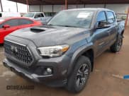 ✅ 2018 Toyota Tacoma SR5 • VIN: 3TMAZ5CN0JM061233 • Lot: 41944668. Listed on IAAI with 94,314 mi. Free auction sales archive from the USA and detailed vehicle history report at DreamBid. Image 2.