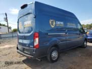 ✅ 2023 Ford Transit Cargo • VIN: 1FTBR2X85PKB04942 • Lot: 69643075. Listed on Copart with 48,870 mi. Free auction sales archive from the USA and detailed vehicle history report at DreamBid. Image 3.