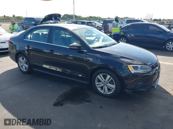 ✅ 2014 Volkswagen Jetta Hybrid • VIN: 3VW637AJ3EM219456 • Lot: 43745704. Listed on IAAI with 105,295 mi. Free auction sales archive from the USA and detailed vehicle history report at DreamBid. Image 1.