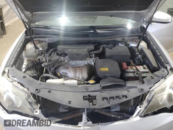 2014 Toyota Camry L z VIN 4T1BF1FK5EU403635, wystawiony jako Copart lot #71117025 z przebiegiem 154 018 mil mil oraz Szkoda całkowita • Salvage title. Historia ofert i sprzedaży dostępna na DreamBid. Obrazek 11.