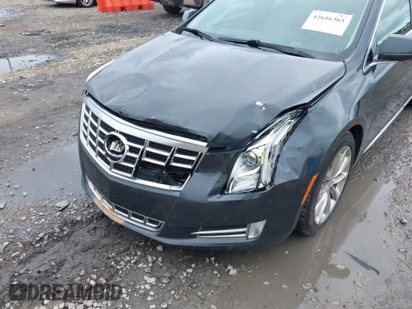 ✅ 2013 Cadillac XTS Premium • VIN: 2G61T5S32D9142784 • Лот: 42616365. Опубликован ранее на IAAI с пробегом 98 512 миль. Бесплатный доступ к архиву аукционных продаж из США и подробный отчёт об истории автомобиля на DreamBid. Изображение 6.