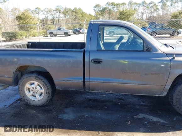 ✅ 2001 Dodge Dakota • VIN: 1B7FL26X91S342103 • Lot: 41277465. Wystawiony na IAAI z przebiegiem 157 993 mil. Bezpłatny archiwum sprzedaży aukcyjnych z USA i szczegółowy raport historii pojazdu na DreamBid. Zdjęcie 13.