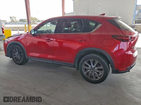 ✅ 2021 Mazda CX-5 Grand Touring • VIN: JM3KFADM4M0308733 • Lot: 92746495. Wystawiony na Copart z przebiegiem 182 809 mil. Bezpłatny archiwum sprzedaży aukcyjnych z USA i szczegółowy raport historii pojazdu na DreamBid. Zdjęcie 2.