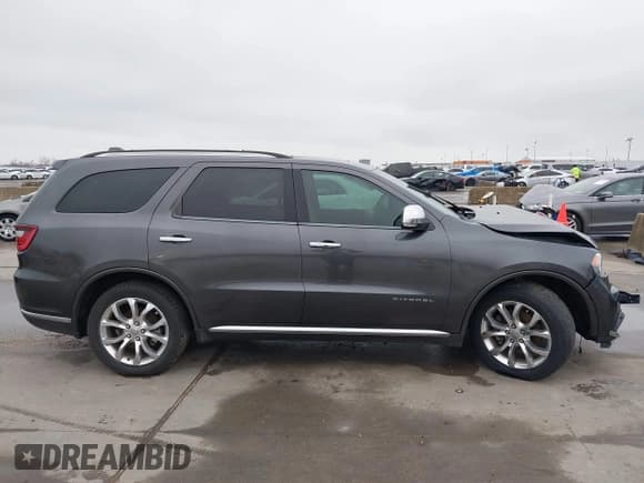 ✅ 2017 Dodge Durango Citadel • VIN: 1C4RDHEG8HC690154 • Lot: 41531898. Listed on IAAI with 142,392 mi. Free auction sales archive from the USA and detailed vehicle history report at DreamBid. Image 13.