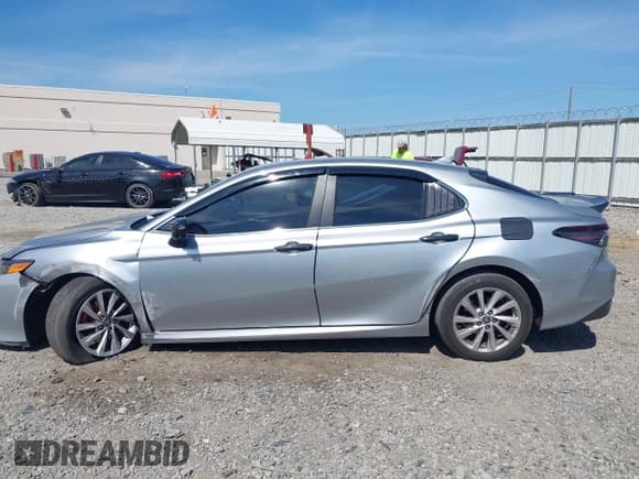 ✅ 2023 Toyota Camry LE • VIN: 4T1C11AK1PU744432 • Lot: 43194710. Listed on IAAI with 32,115 mi. Free auction sales archive from the USA and detailed vehicle history report at DreamBid. Image 14.