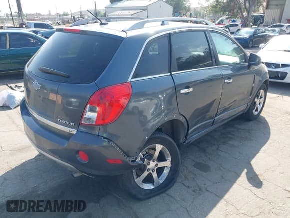 ✅ 2013 Chevrolet Captiva Sport LT • VIN: 3GNAL3EK4DS581063 • Lot: 42111098. Wystawiony na IAAI z przebiegiem 178 301 mil. Bezpłatny archiwum sprzedaży aukcyjnych z USA i szczegółowy raport historii pojazdu na DreamBid. Zdjęcie 4.