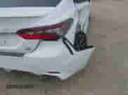 2022 Toyota Camry SE with VIN 4T1G11BK6NU051837, listed as a IAAI auction lot 42691924 with 105,238 mi miles and . Bid and sale history available at DreamBid. Image 6.