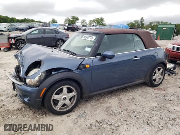 ✅ 2010 MINI Convertible • VIN: WMWMR3C58ATU98333 • Lot: 58912775. Listed on Copart with 82,701 mi. Free auction sales archive from the USA and detailed vehicle history report at DreamBid. Image 1.