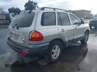 2003 Hyundai Santa Fe z VIN KM8SB12B73U504531, wystawiony jako IAAI lot #41506719 z przebiegiem 164 566 mil mil oraz . Historia ofert i sprzedaży dostępna na DreamBid. Obrazek 4.