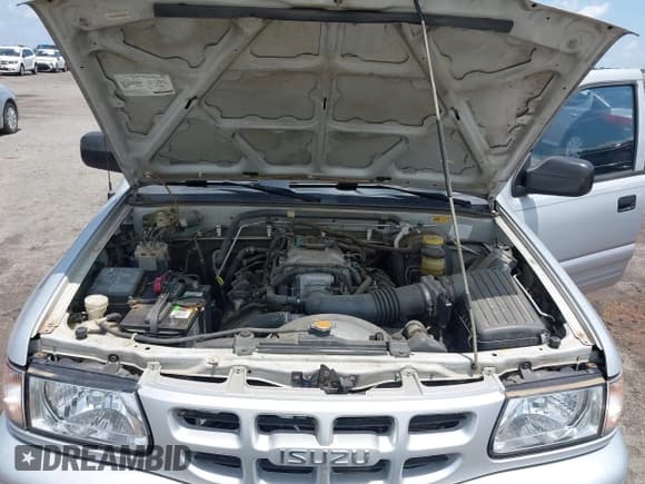 ✅ 2001 Isuzu Rodeo S • VIN: 4S2CK58W914357933 • Lot: 42427142. Listed on IAAI with 129,131 mi. Free auction sales archive from the USA and detailed vehicle history report at DreamBid. Image 10.