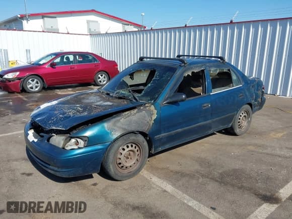 ✅ 1999 Toyota Corolla VE • VIN: 2T1BR12E1XC200396 • Lot: 42814852. Listed on IAAI with Not provided. Free auction sales archive from the USA and detailed vehicle history report at DreamBid. Image 2.