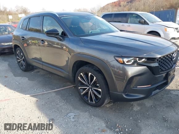 ✅ 2024 Mazda CX-50 S Premium Plus • VIN: 7MMVABEM5RN242101 • Lot: 43644569. Listed on IAAI with 7,102 mi. Free auction sales archive from the USA and detailed vehicle history report at DreamBid. Image 1.