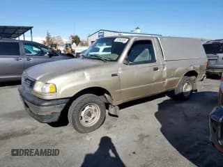 ✅ 1999 Mazda B-Series SX • VIN: 4F4YR12C1XTM39102 • Lot: 83462634. Listed on Copart with 241,380 mi. Free auction sales archive from the USA and detailed vehicle history report at DreamBid. Image 1.