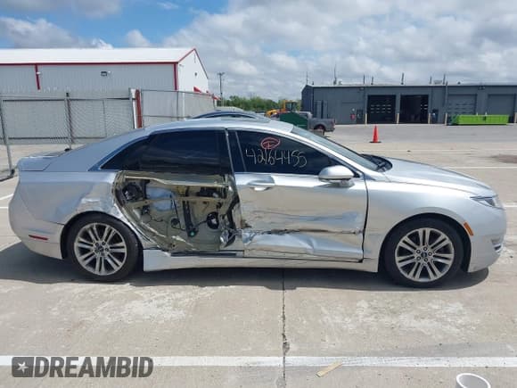 ✅ 2015 Lincoln MKZ • VIN: 3LN6L2GK5FR622117 • Lot: 42164455. Listed on IAAI with 167,156 mi. Free auction sales archive from the USA and detailed vehicle history report at DreamBid. Image 13.