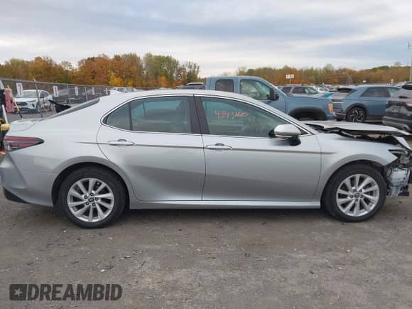 2022 Toyota Camry LE with VIN 4T1R11BK9NU067765, listed as a IAAI auction lot 43431610 with 60,319 mi miles and . Bid and sale history available at DreamBid. Image 13.