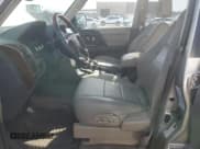 ✅ 2004 Mitsubishi Montero Limited • VIN: JA4MW51S44J004933 • Lot: 46561465. Listed on Copart with 213,714 mi. Free auction sales archive from the USA and detailed vehicle history report at DreamBid. Image 7.