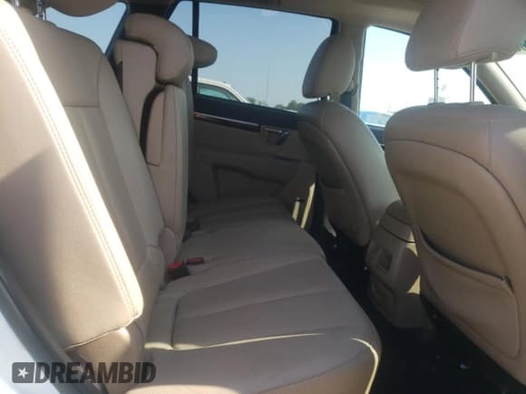 ✅ 2012 Hyundai Santa Fe Limited • VIN: 5XYZKDAG7CG101734 • Lot: 65805424. Listed on Copart with 65,711 mi. Free auction sales archive from the USA and detailed vehicle history report at DreamBid. Image 13.