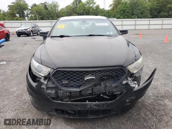 ✅ 2014 Ford Police Interceptor • VIN: 1FAHP2MK0EG148451 • Lot: 69101515. Wystawiony na Copart z przebiegiem 192 918 mil. Bezpłatny archiwum sprzedaży aukcyjnych z USA i szczegółowy raport historii pojazdu na DreamBid. Zdjęcie 5.