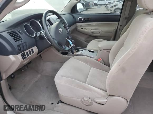 2005 Toyota Tacoma with VIN 5TEUU42N75Z113067, listed as a Copart auction lot 75220034 with 123,653 mi miles and Salvage title. Bid and sale history available at DreamBid. Image 7.