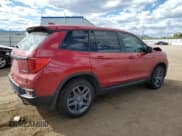 ✅ 2022 Honda Passport EX-L • VIN: 5FNYF8H59NB029196 • Lot: 84275115. Listed on Copart with 72,739 mi. Free auction sales archive from the USA and detailed vehicle history report at DreamBid. Image 3.