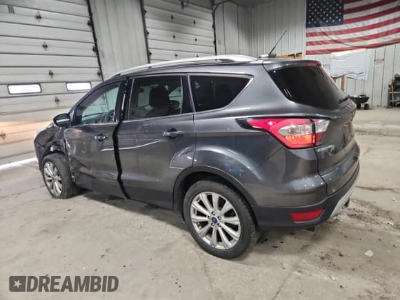 ✅ 2017 Ford Escape Titanium • VIN: 1FMCU9J92HUD36414 • Лот: 92243825. Опубликован ранее на Copart с пробегом 116 095 миль. Бесплатный доступ к архиву аукционных продаж из США и подробный отчёт об истории автомобиля на DreamBid. Изображение 2.
