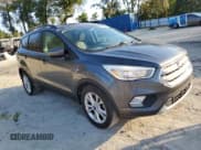 ✅ 2018 Ford Escape SE • VIN: 1FMCU0GD7JUC27721 • Lot: 93012415. Listed on Copart with 144,625 mi. Free auction sales archive from the USA and detailed vehicle history report at DreamBid. Image 4.