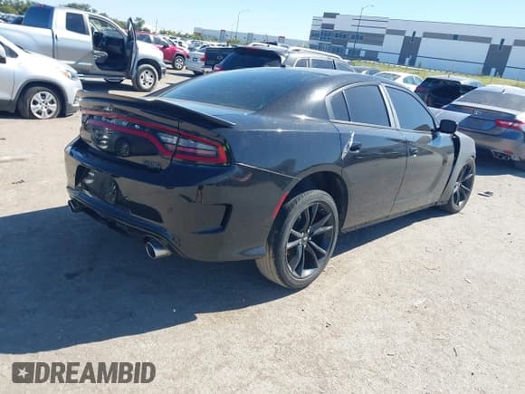 ✅ 2018 Dodge Charger SXT • VIN: 2C3CDXBG4JH247740 • Lot: 43516843. Listed on IAAI with 88,424 mi. Free auction sales archive from the USA and detailed vehicle history report at DreamBid. Image 4.