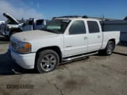 ✅ 2006 GMC Sierra Denali • VIN: 2GTEK63N161127525 • Lot: 86103495. Listed on Copart with 205,565 mi. Free auction sales archive from the USA and detailed vehicle history report at DreamBid. Image 1.