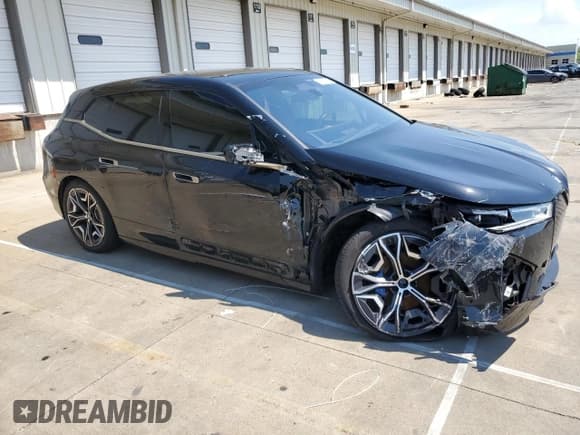 ✅ 2022 BMW iX xDrive50 • VIN: WB523CF02NCK62693 • Lot: 65888515. Listed on Copart with 75,494 mi. Free auction sales archive from the USA and detailed vehicle history report at DreamBid. Image 4.