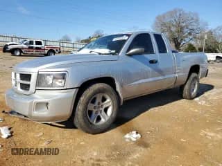 2010 Dodge Dakota с VIN 1D7CE3BK7AS119870, выставлен на аукционе Copart как лот 86590584 с пробегом 110 734 миль миль и Списание • Salvage title. История ставок и продаж доступна на DreamBid. Изображение 1.