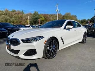 ✅ 2021 BMW 8 Series M850i • VIN: WBAGV8C01MCG76388 • Лот: 90394145. Опубликован ранее на Copart с пробегом 62 877 миль. Бесплатный доступ к архиву аукционных продаж из США и подробный отчёт об истории автомобиля на DreamBid. Изображение 2.