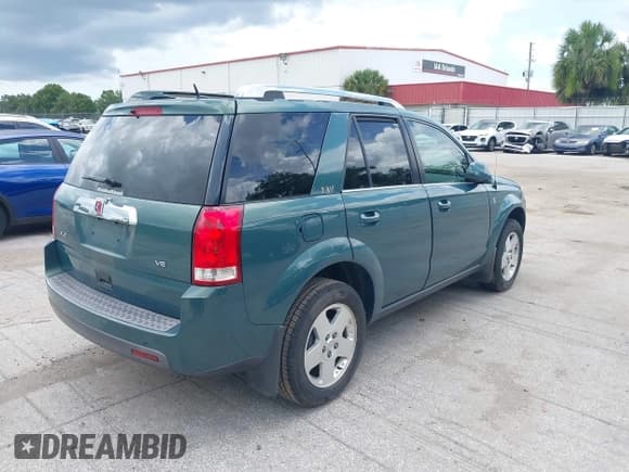 ✅ 2006 Saturn VUE • VIN: 5GZCZ53406S829936 • Lot: 42469354. Listed on IAAI with 133,515 mi. Free auction sales archive from the USA and detailed vehicle history report at DreamBid. Image 4.
