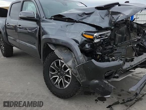 ✅ 2023 Toyota Tacoma TRD Sport • VIN: 3TMCZ5AN1PM557548 • Лот: 82419795. Опубликован ранее на Copart с пробегом 58 725 миль. Бесплатный доступ к архиву аукционных продаж из США и подробный отчёт об истории автомобиля на DreamBid. Изображение 14.