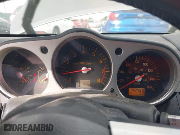 ✅ 2004 Nissan 350Z Enthusiast • VIN: JN1AZ36A54T002717 • Lot: 42723894. Wystawiony na IAAI z przebiegiem 148 468 mil. Bezpłatny archiwum sprzedaży aukcyjnych z USA i szczegółowy raport historii pojazdu na DreamBid. Zdjęcie 7.