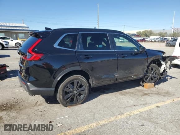✅ 2024 Honda CR-V Sport Touring • VIN: 5J6RS6H90RL011531 • Lot: 87476325. Listed on Copart with 30,534 mi. Free auction sales archive from the USA and detailed vehicle history report at DreamBid. Image 3.