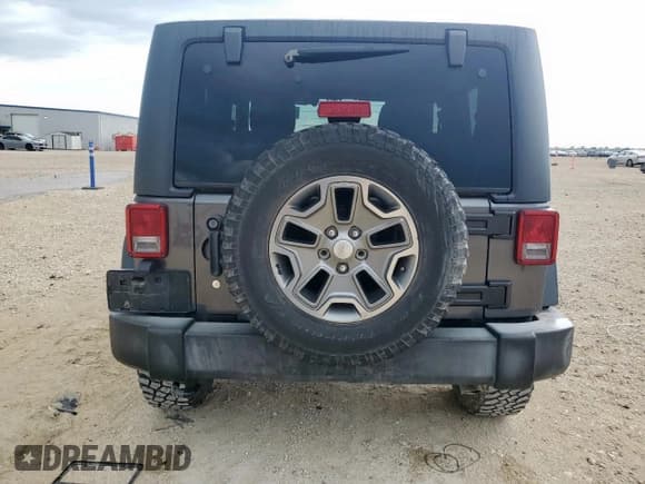 ✅ 2016 Jeep Wrangler Willys Wheeler • VIN: 1C4GJWAG3GL338625 • Lot: 64789905. Listed on Copart with 79,470 mi. Free auction sales archive from the USA and detailed vehicle history report at DreamBid. Image 6.