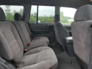 ✅ 1998 Jeep Grand Cherokee Laredo • VIN: 1J4GZ58SXWC144437 • Лот: 60437094. Опубликован ранее на Copart с пробегом 183 908 миль. Бесплатный доступ к архиву аукционных продаж из США и подробный отчёт об истории автомобиля на DreamBid. Изображение 12.