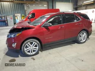 ✅ 2020 Chevrolet Equinox Premier • VIN: 2GNAXYEX7L6223725 • Лот: 49324475. Опубликован ранее на Copart с пробегом 59 102 миль. Бесплатный доступ к архиву аукционных продаж из США и подробный отчёт об истории автомобиля на DreamBid. Изображение 1.