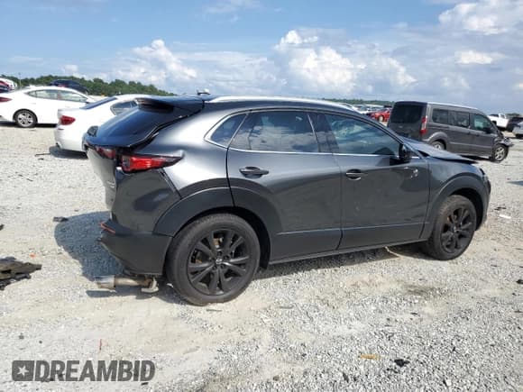 ✅ 2023 Mazda CX-30 Premium • VIN: 3MVDMBDY7PM572335 • Lot: 66309425. Wystawiony na Copart z przebiegiem 87 436 mil. Bezpłatny archiwum sprzedaży aukcyjnych z USA i szczegółowy raport historii pojazdu na DreamBid. Zdjęcie 3.