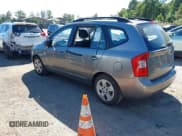 ✅ 2009 Kia Rondo LX • VIN: KNAFG528297284979 • Lot: 43337525. Listed on IAAI with 140,396 mi. Free auction sales archive from the USA and detailed vehicle history report at DreamBid. Image 3.