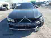 2020 BMW 3 Series 330i xDrive z VIN WBA5R7C01LFH48872, wystawiony jako IAAI lot #42136088 z przebiegiem Nie podano mil oraz . Historia ofert i sprzedaży dostępna na DreamBid. Obrazek 11.