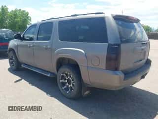 2012 Chevrolet Suburban LT z VIN 1GNSKJE72CR262365, wystawiony jako IAAI lot #42550644 z przebiegiem 159 459 mil mil oraz . Historia ofert i sprzedaży dostępna na DreamBid. Obrazek 3.