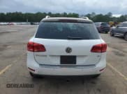 ✅ 2013 Volkswagen Touareg Lux • VIN: WVGEF9BP4DD013167 • Lot: 60422255. Listed on Copart with 157,319 mi. Free auction sales archive from the USA and detailed vehicle history report at DreamBid. Image 6.