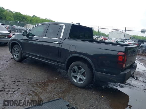 ✅ 2021 Honda Ridgeline RTL-E • VIN: 5FPYK3F75MB015370 • Lot: 42253586. Listed on IAAI with 84,188 mi. Free auction sales archive from the USA and detailed vehicle history report at DreamBid. Image 3.
