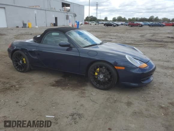 ✅ 1999 Porsche Boxster • VIN: WP0CA2984XU621338 • Lot: 86281925. Listed on Copart with 71,987 mi. Free auction sales archive from the USA and detailed vehicle history report at DreamBid. Image 4.